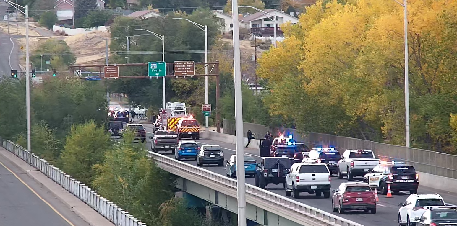 Grand Ave Bridge with police investigating