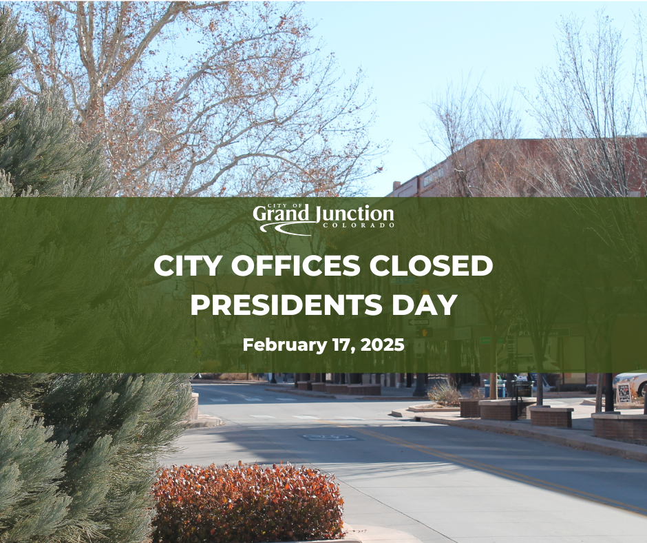 View of Main Street in Grand Junction midday with text on graphic