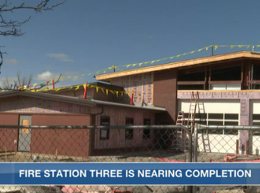 Station 3 under construction with a fence and some flags around