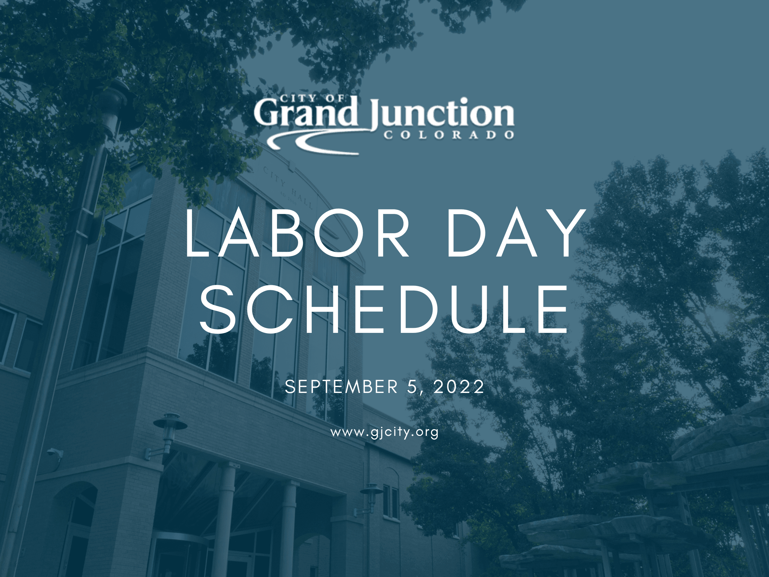 city hall with blue overlay and white letters that read labor day schedule