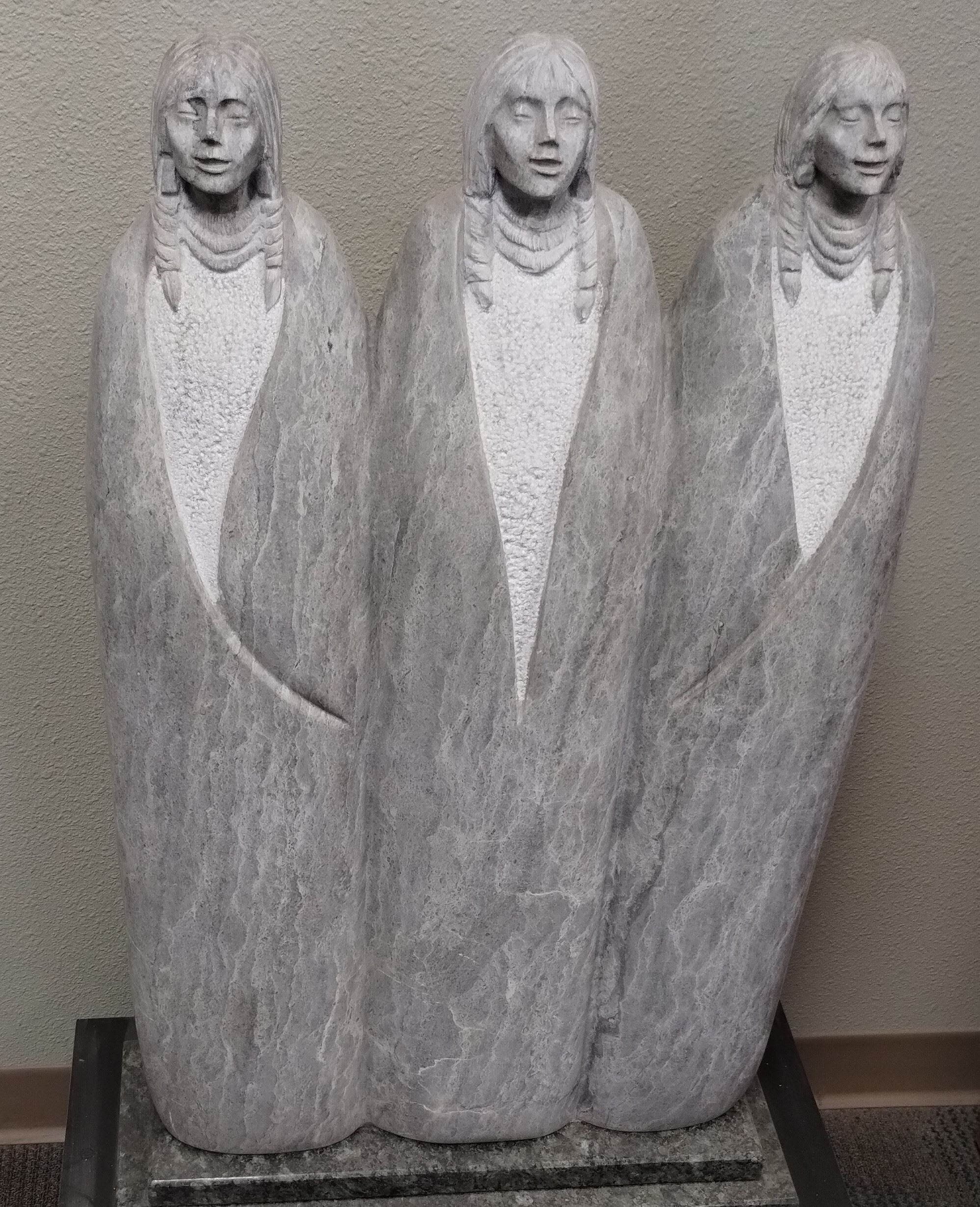 Three Sisters- Statue of 3 sisters carved in stone Opens in new window